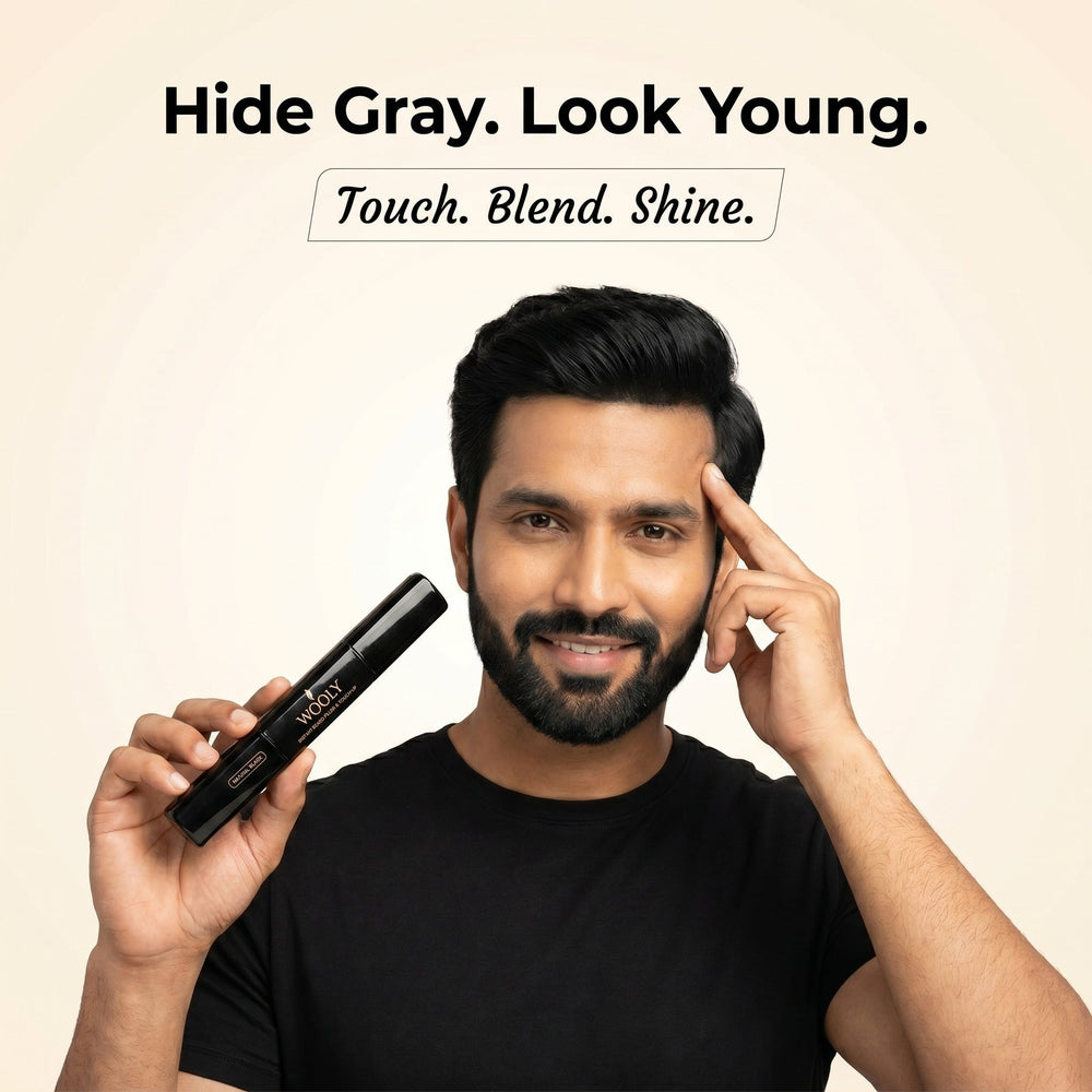 Man with a dark beard holding the Wooly Beard Touch-Up pen, captioned hide grey and look young