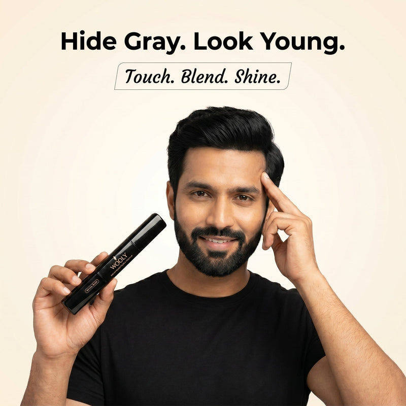 Man with a dark beard holding the Wooly Beard Touch-Up pen, captioned hide grey and look young