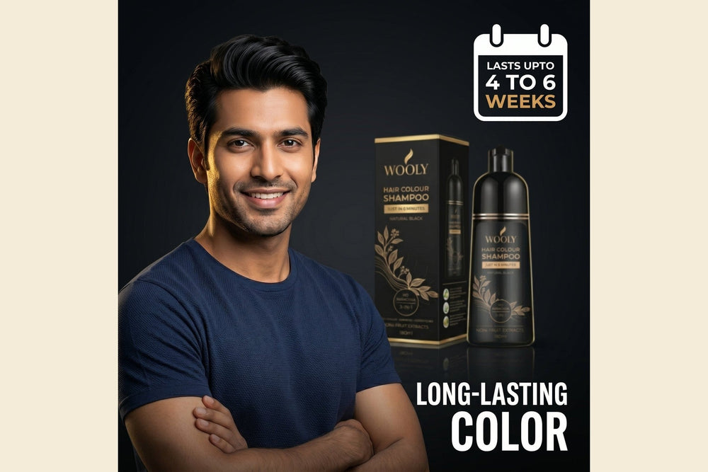 Man in a navy t-shirt beside the Wooly Hair Colour Shampoo bottle and carton, badged lasts up to 4 to 6 weeks